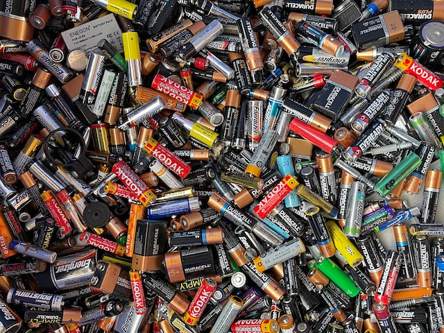 used batteries thrown away as electronic waste